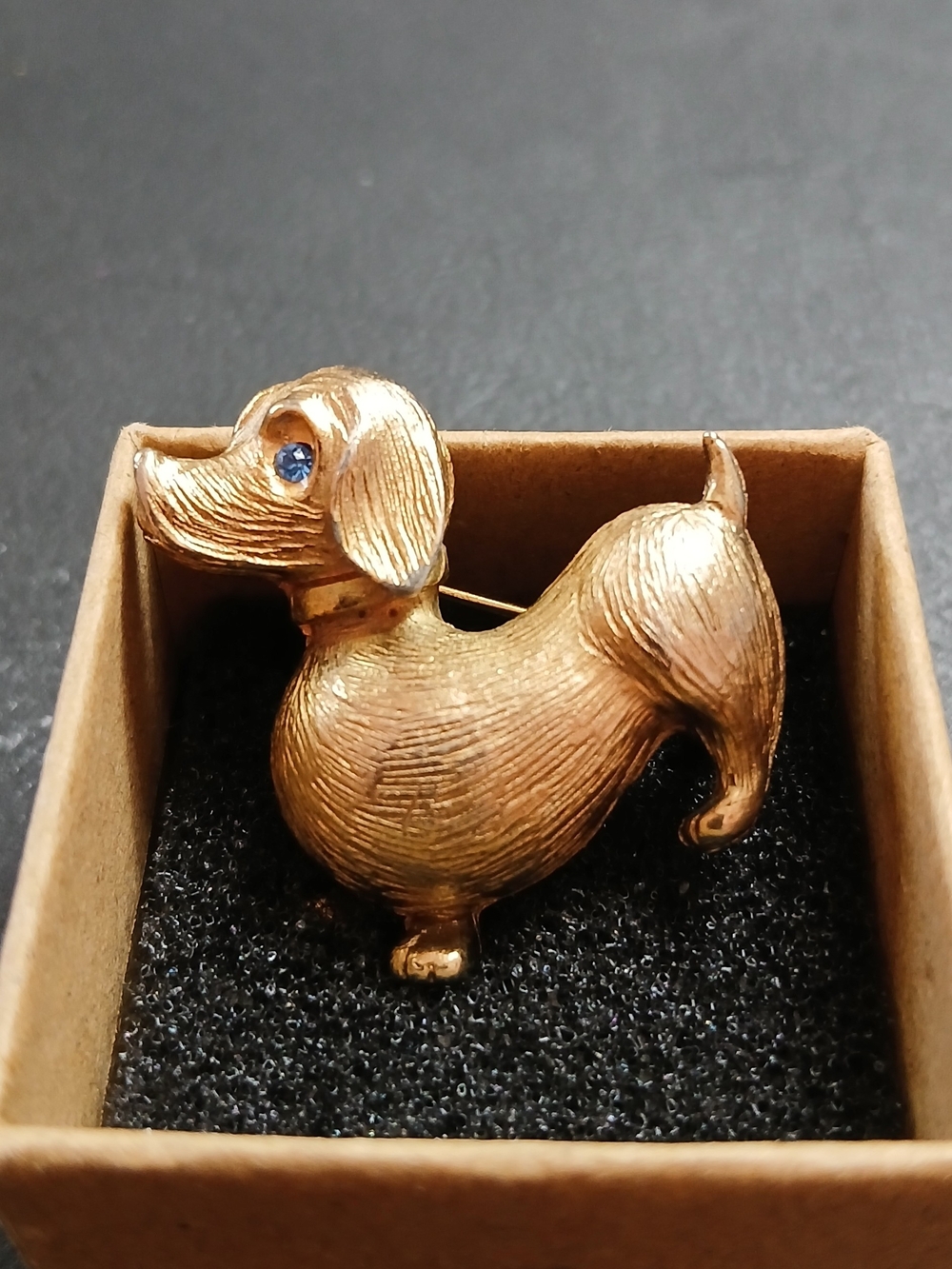 Gold-tone Dachshund Brooch with Blue Eye